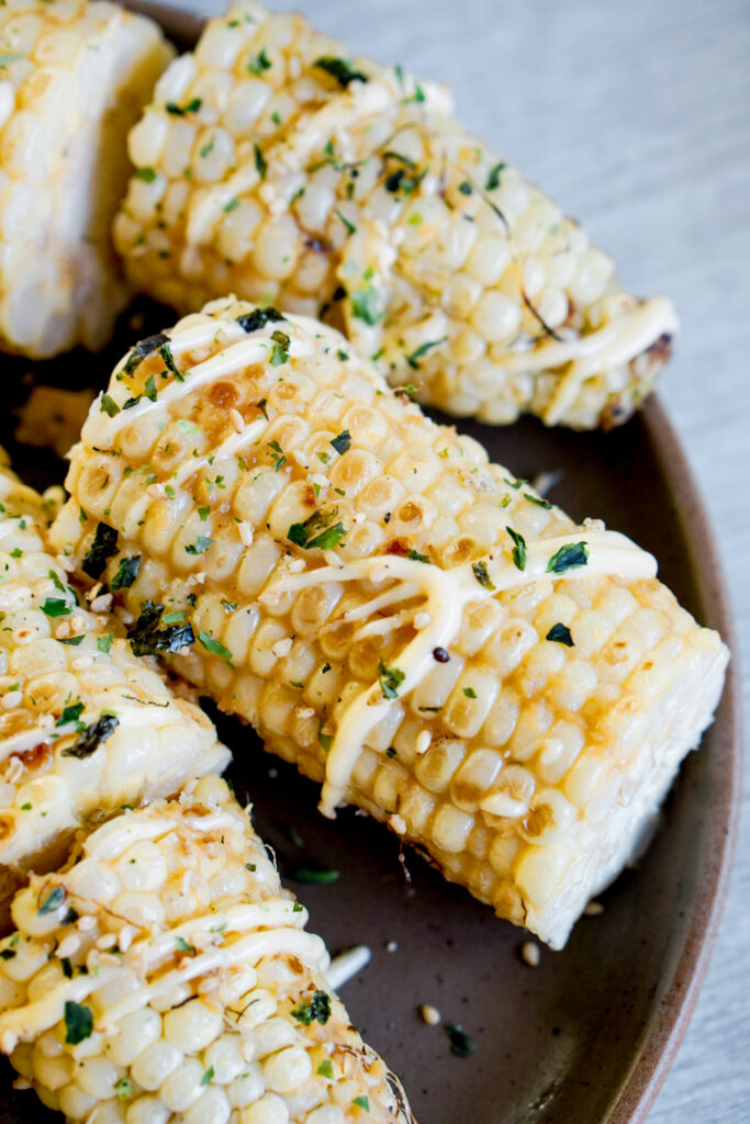 Japanese style grilled corn with miso butter, mayo, and furikake