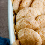 closeup of yuzu cookies in a blue ceramic dish