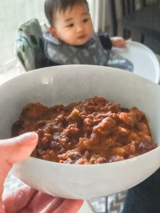 baby eating chili rice