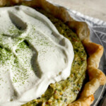 matcha pistachi pie overhead view with whipped cream