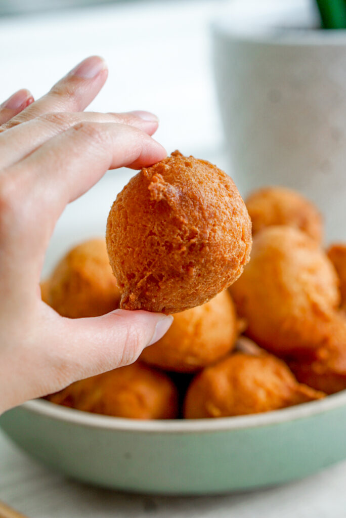 sata andagi closeup held by hand