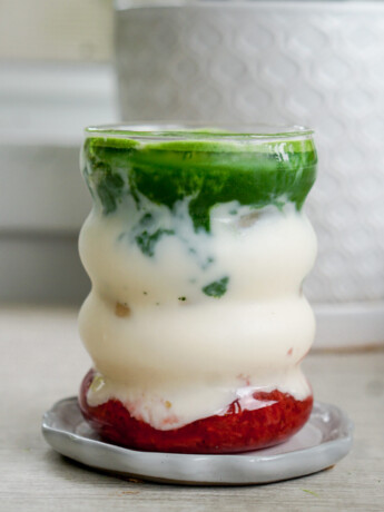 strawberry matcha latte in glass cup
