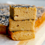 Three Japanese sweet potato butter mochi stacked on top of each other