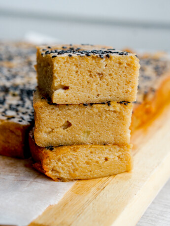 Three Japanese sweet potato butter mochi stacked on top of each other