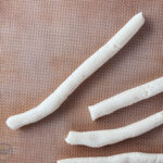 homemade white rabbit candies in a long rope